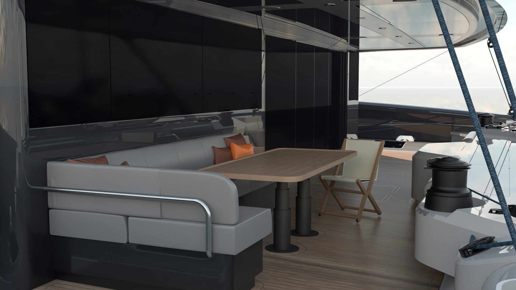 Seating area with table on the aft deck of the Bellevue Eco catamaran